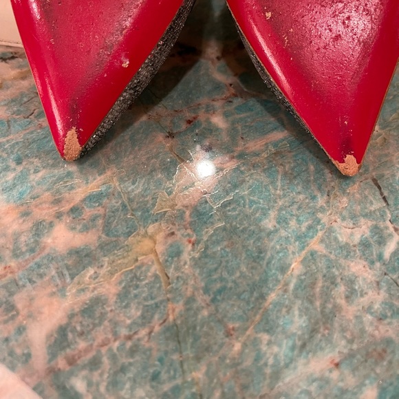 Louboutin pointy heels